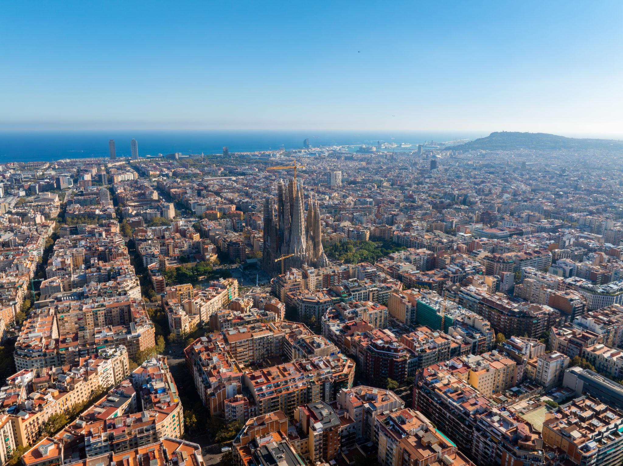 Aerial view of Barcelona with Sagrada Familia and Mediterranean sea, 45 minutes from Masia St Salvador 1582